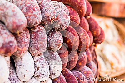 Selection of traditional Italian cured meats and sausages at street food market Stock Photo