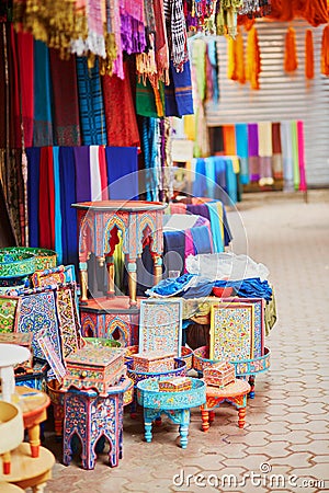 Selection of wooden furniture on a traditional Moroccan market Stock Photo
