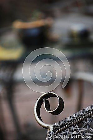 Selective close-up of the curled edge of a rafia chair. Stock Photo