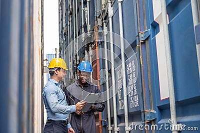 Selective focus at African black worker while talk and having discussion with supervisor and inspect the condition of all Stock Photo