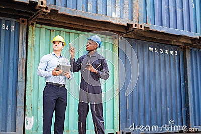 Selective focus at African black worker while talk and having discussion with supervisor and inspect the condition of all Stock Photo