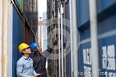 Selective focus at African black worker while talk and having discussion with supervisor and inspect the condition of all Stock Photo