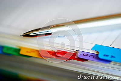 Macro closeup of alphabetical index of address book with mechanical pencil Stock Photo