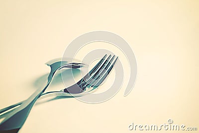 Selective focus of close up dinning silverware fork and spoon on Stock Photo