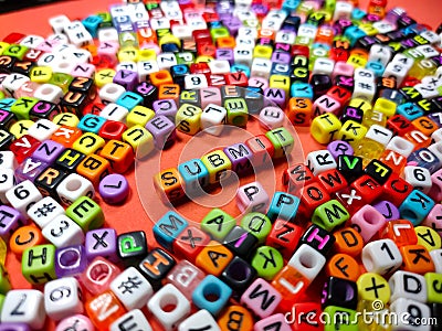 Selective focus.Colorful dice with word SUBMIT on red background.Shot were noise and film grain. Stock Photo