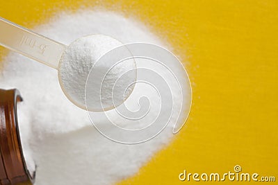 Selective focus of creatine monohydrate powder in scoop Stock Photo