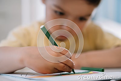 Selective focus of cute, attentive child Stock Photo