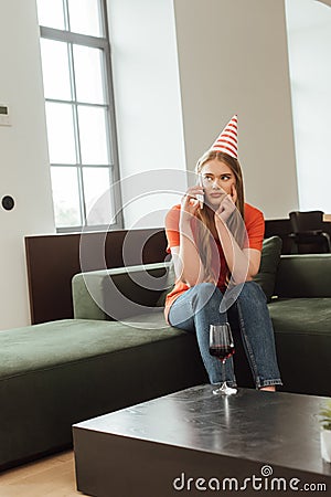 Selective focus of displeased girl in Stock Photo
