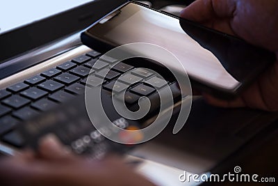 Selective focus on laptop online mobile phone payment internet b Stock Photo