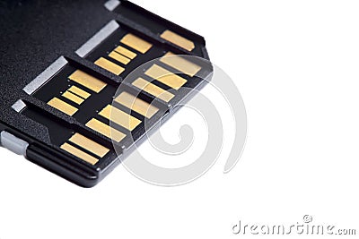 Selective focus photo of two rows of golden contacts on back of UHS-II high speed memory card isolated on white background close Stock Photo