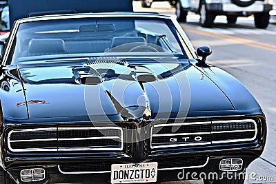 Selective focus shot of a black pontiac GTO car Editorial Stock Photo