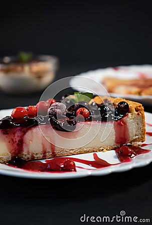 Selective focus shot of a piece of cheesecake with berries Stock Photo