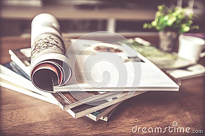 selective focus of stacking magazine place on table in living Stock Photo