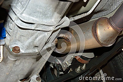 Catalytic Converted with Oxygen Sensor Under Car Stock Photo