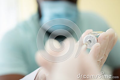 Selective focus of syringe, African American Wear a medical mask and being covid vaccinated for the prevention of coronavirus and Stock Photo