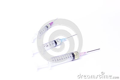 Selective focus syringe with white background,Injection needle select focus,Medical instruments Stock Photo