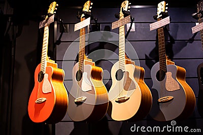 Selective focus to guitar in music shop, many guitars, pop rock artist song music and entertainment instrument Editorial Stock Photo