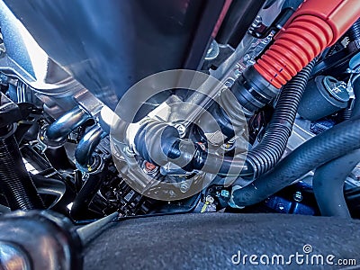 Selective focus to hybrid automotive industry part of modern new car engine room, Machine show all parts and open hood Stock Photo