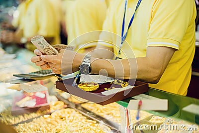Selective focus to staff are counting banknote Stock Photo