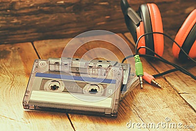 Selective focus of top view of vintage headphones and cassettes Stock Photo