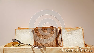 Selective Focused White and Brown Healthy Organic Farmhouse Sandwich Bread Lines, ready to eat or toast in morning breakfast meal Stock Photo