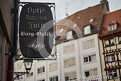 Selective of an old sign of a store in Nuremberg, Germany Stock Photo