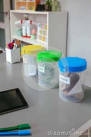 Selective trash bins and over desk in environmental classroom Stock Photo