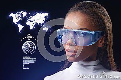 Self-assured mulatto woman using future technology eyeglasses Stock Photo