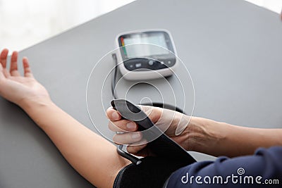 Self blood pressure and heart rate measurement Stock Photo