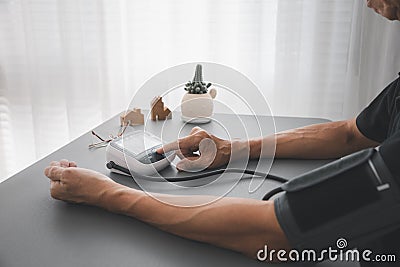 Self blood pressure and heart rate measurement Stock Photo