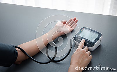 Self blood pressure and heart rate measurement Stock Photo