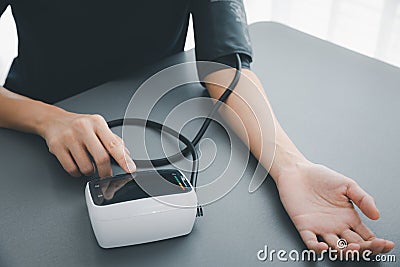 Self blood pressure and heart rate measurement Stock Photo