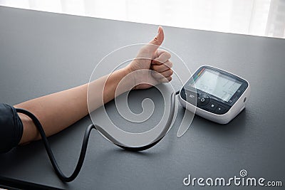 Self blood pressure and heart rate measurement Stock Photo