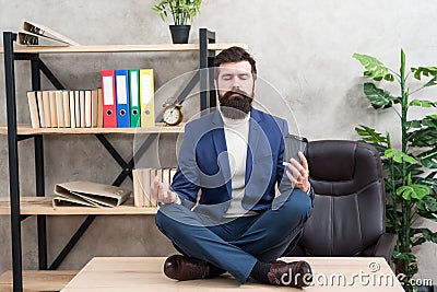 Self care. Psychological help. Relaxation techniques. Mental wellbeing and relax. Man bearded manager formal suit sit Stock Photo