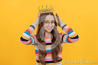 self confident queen. expressing smug. arrogant princess in tiara. cheerful proud child. Stock Photo