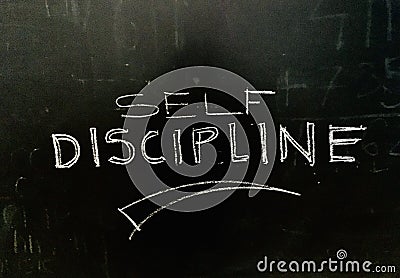 Self Discipline Handwritten on Blackboard stock photo Stock Photo