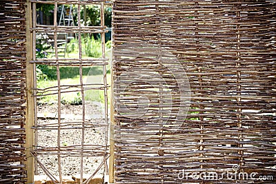 Self-made garden fence Stock Photo