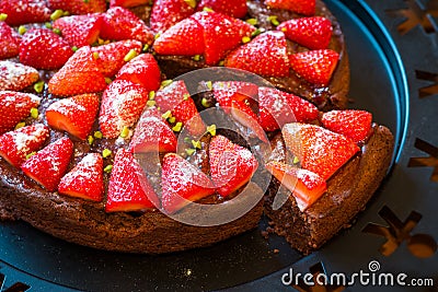 Self made piece of fresh baked strawberry chocolate cake Stock Photo