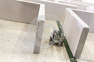 Self-made robot in a maze Stock Photo