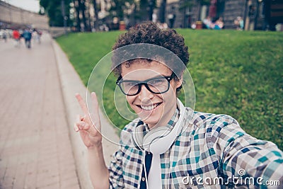 Self-portrait of curly haired cute attractive foolish smiling fu Stock Photo