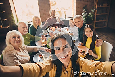 Self-portrait of nice attractive cheerful big full family brother sister gathering parents grandparents eating homemade Stock Photo