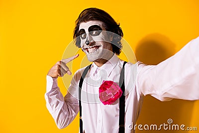 Self-portrait of nice handsome creepy baleful cheerful cheery guy having fun showing demonstrating teeth beaming healthy Stock Photo