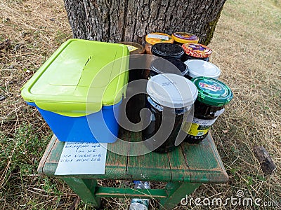 Self service local store at Scarisoara hamlet, Cerna Mountains, Romania Editorial Stock Photo