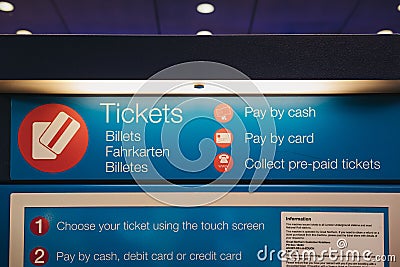 Self-service ticket machine inside King`s Cross station, London, UK. Editorial Stock Photo