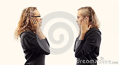 Self talk concept. Young woman talking to herself, showing gestures. Double portrait from two different side views. Stock Photo