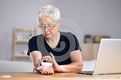 Self Testing Blood Pressure Stock Photo