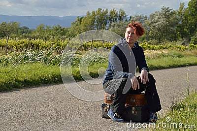 Selfconfident red-haired woman on vacation Stock Photo