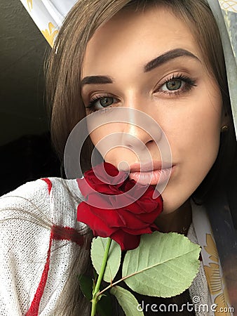 Selfie beautiful young girl with Rose Stock Photo