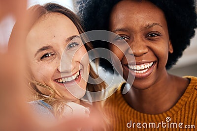Selfie, couple and smile with love, commitment and connection with social media, bonding or marriage. Portrait, girls or Stock Photo