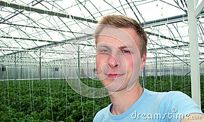 Selfie in greenhouse Stock Photo